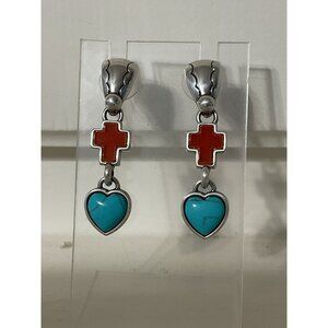 silver-toned dangle drop earrings featuring a red cross and a turquoise heart in